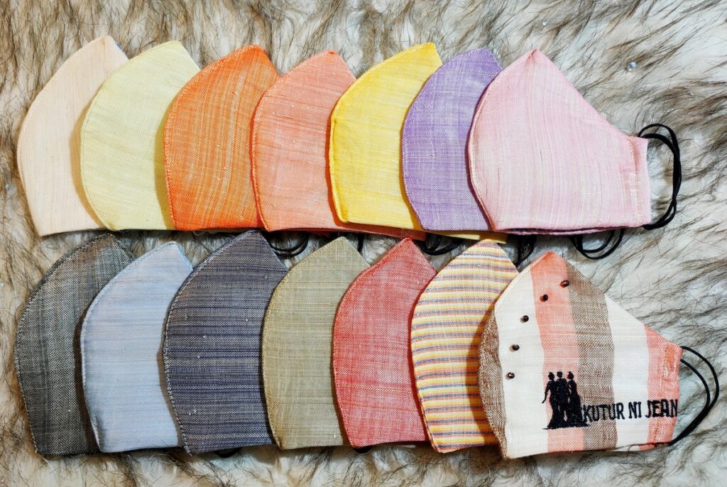 Jean uses different colors of pinukpok fabric for her masks